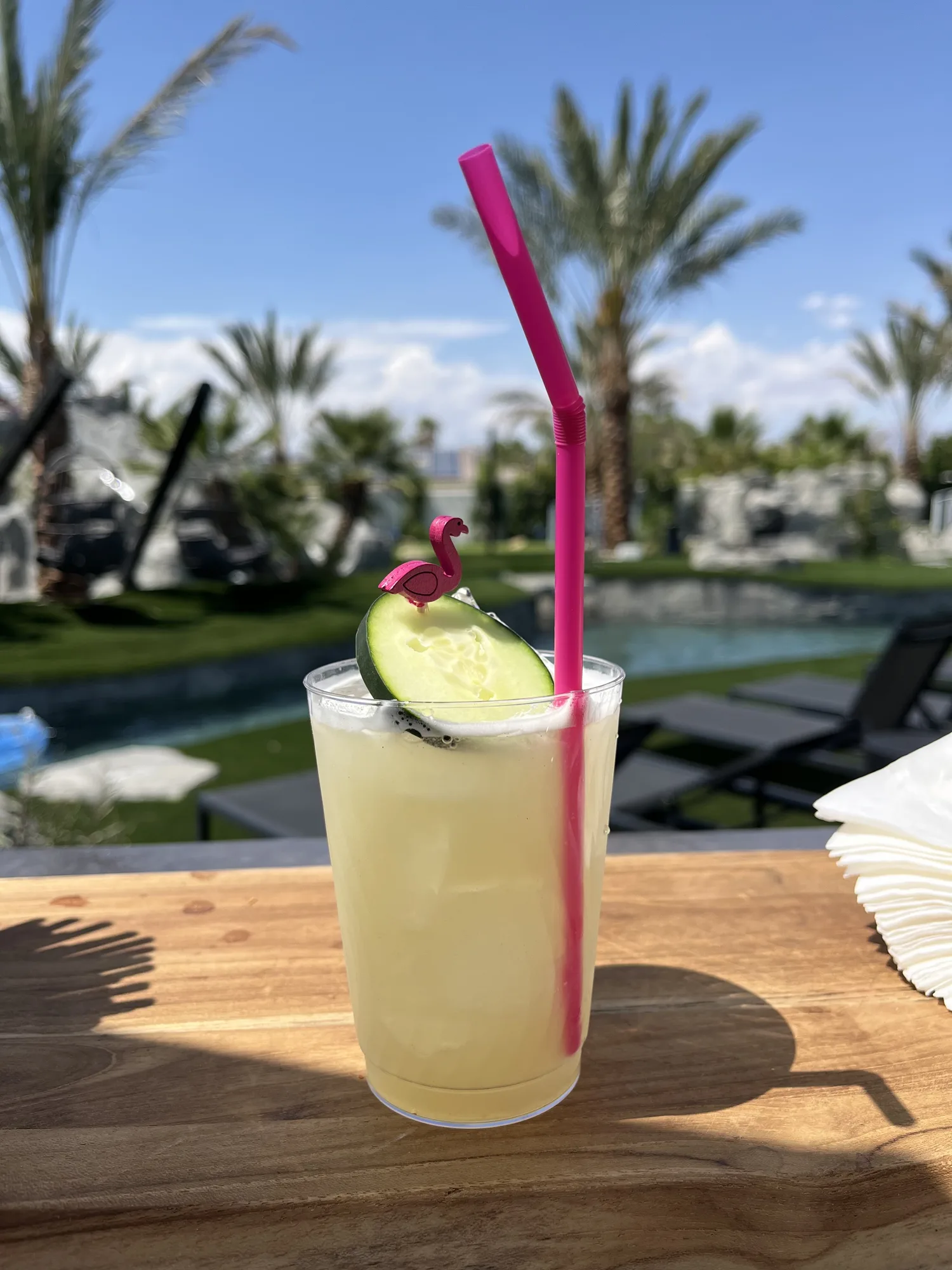 A pale tropical cocktail in a Palm Springs setting.