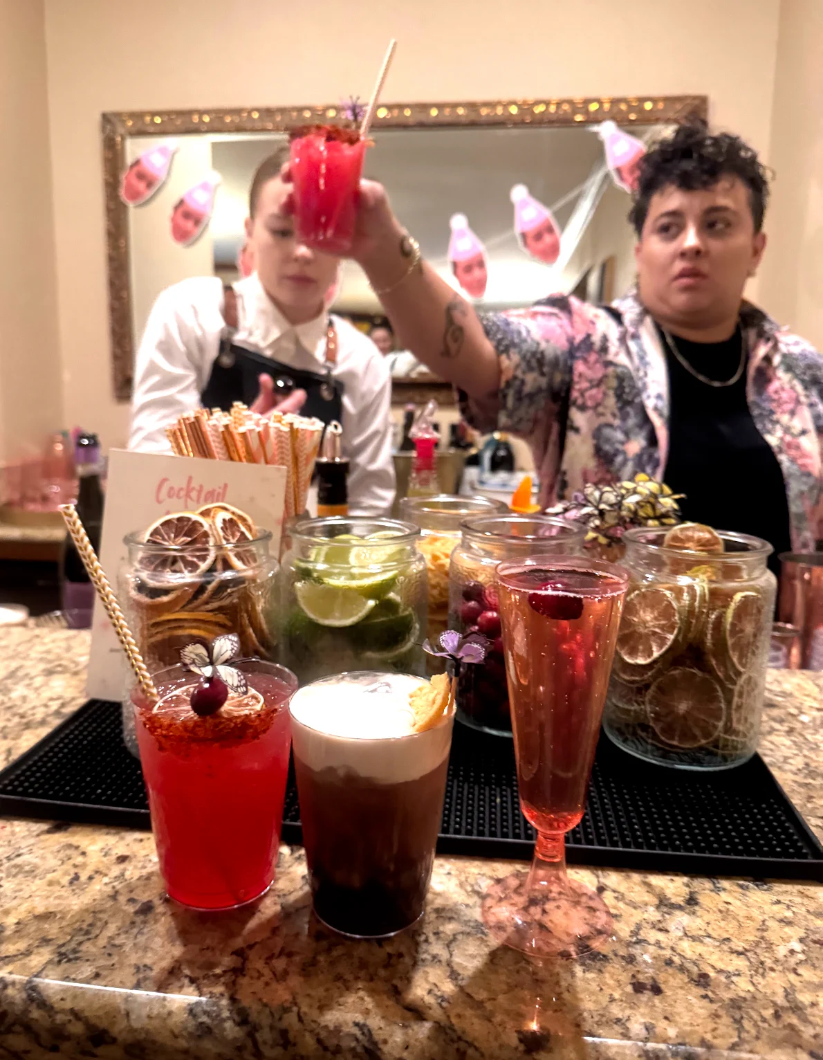A colorful assortment of birthday cocktails on the bar.